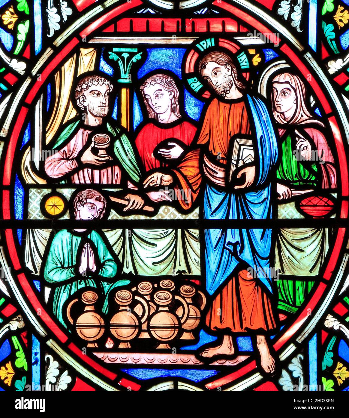 Scene from Life of Jesus, by Adolph Didron, Paris, 1860, stained glass window, Feltwell, Norfolk, Jesus at Cana Wedding Feast, turns water into wine Stock Photo