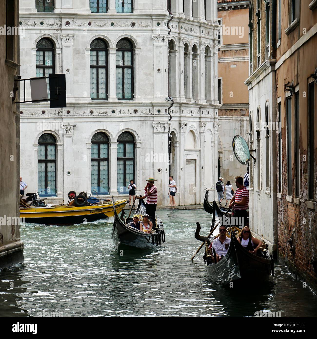 Italian Gondoliers in the famous Gondolas in Venice, Italy Stock Photo