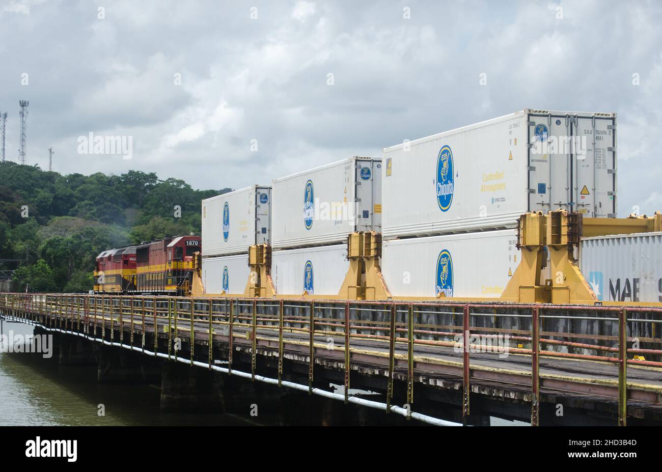 Panama Canal railway transporting Chiquita Banana containers, passing through Gamboa Bridge Stock Photo