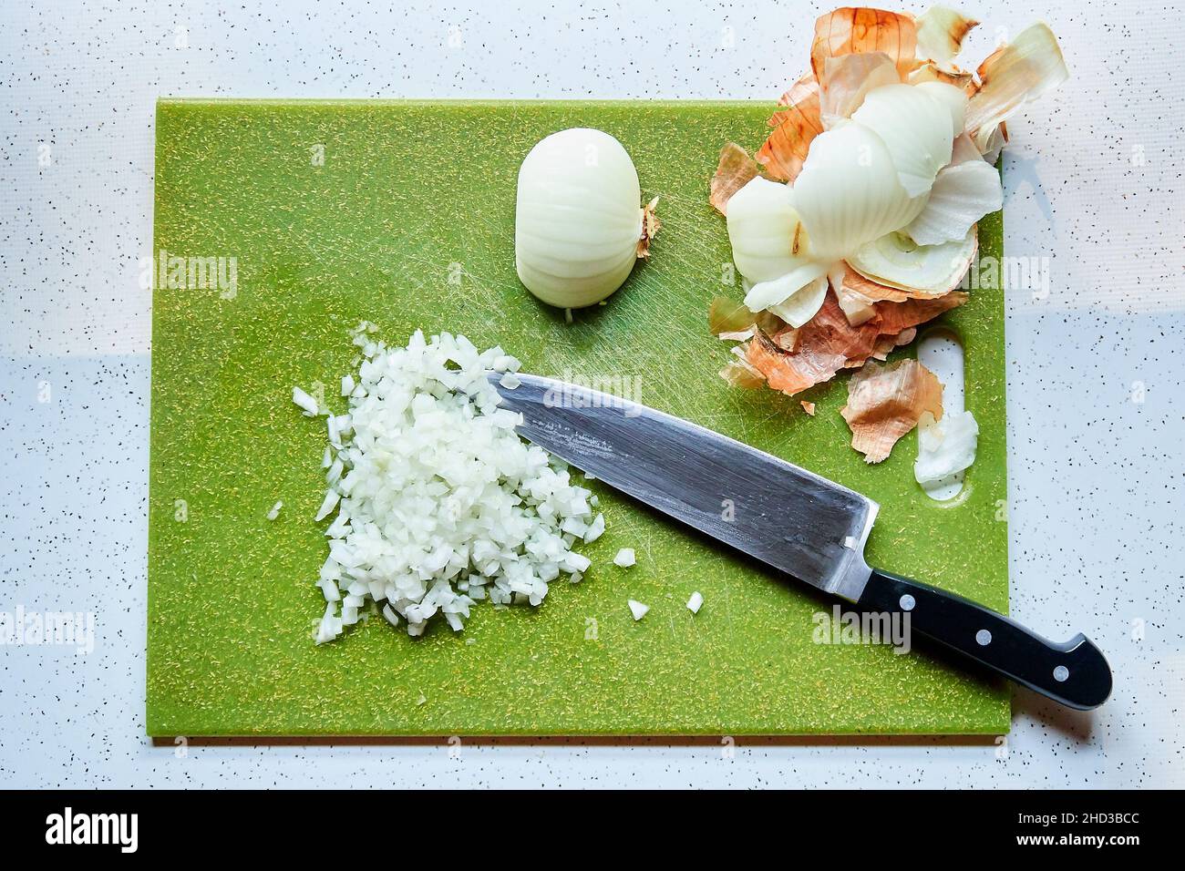 Top View of Diced Onion and Chef's Knife on Green Plastic Chopping ...