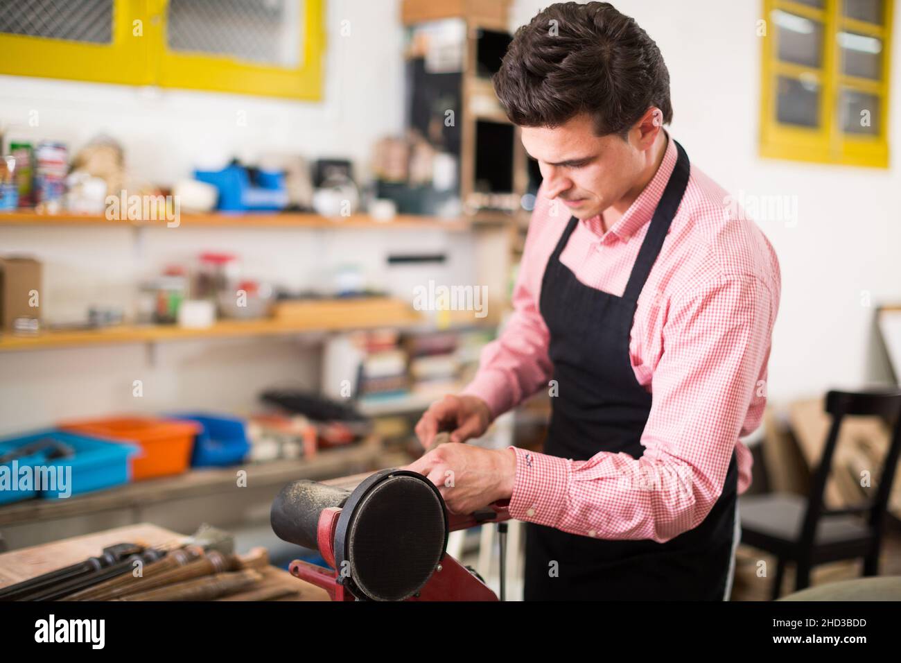 Carpenter working on manual lathe Stock Photo Alamy