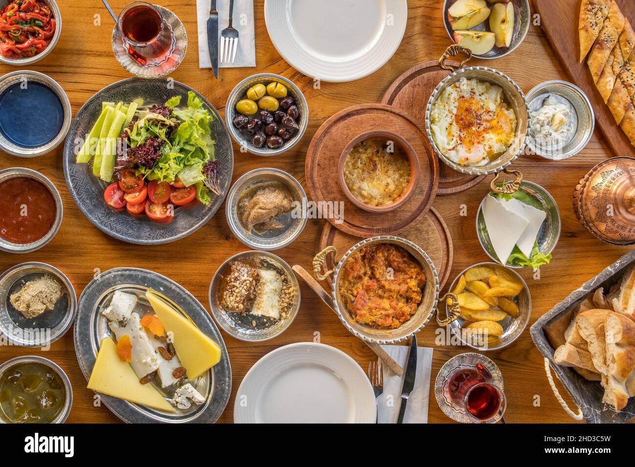 Traditional rich Turkish village breakfast on the wooden table Stock Photo