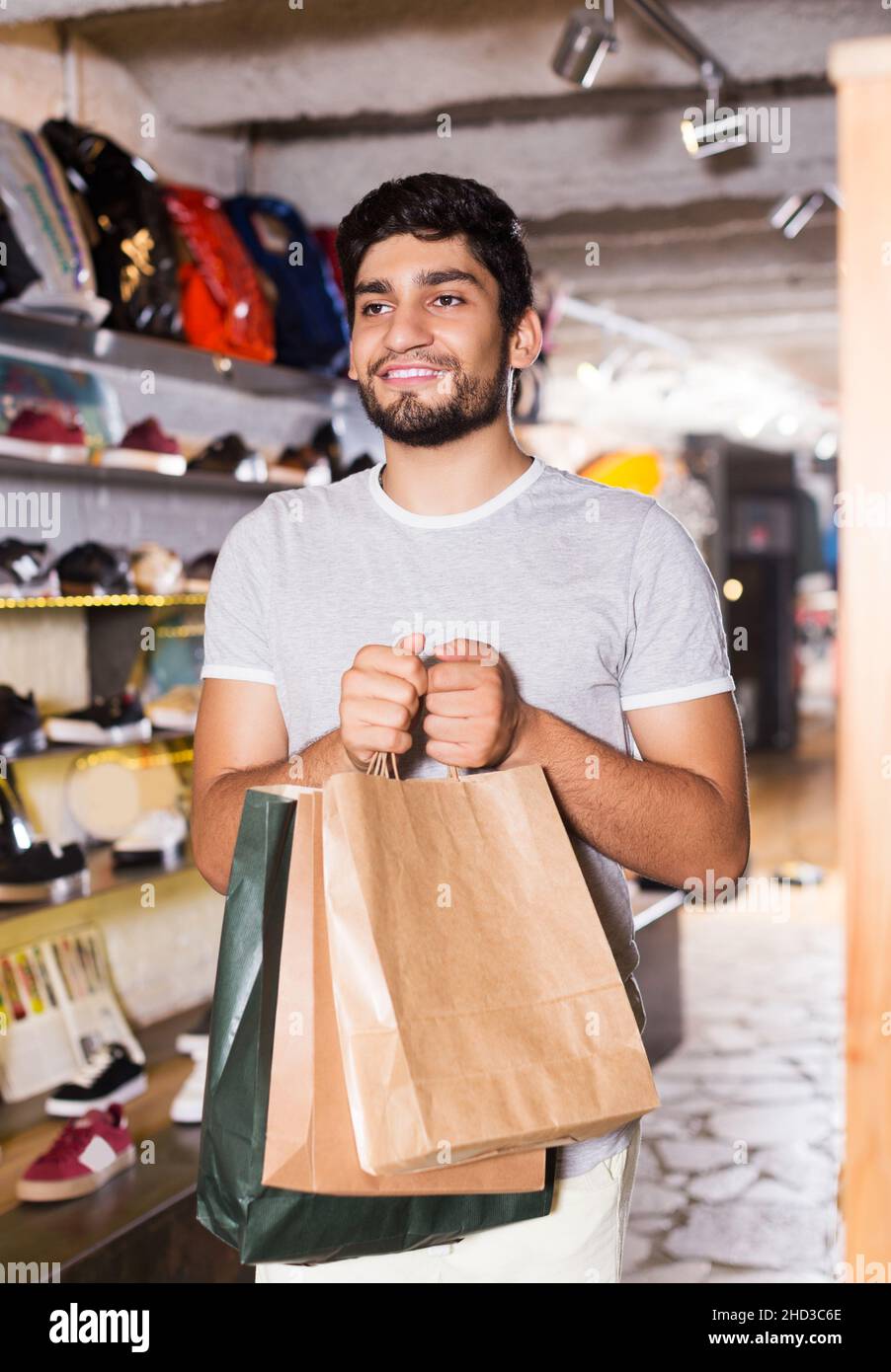 male holding paper bags Stock Photo Alamy