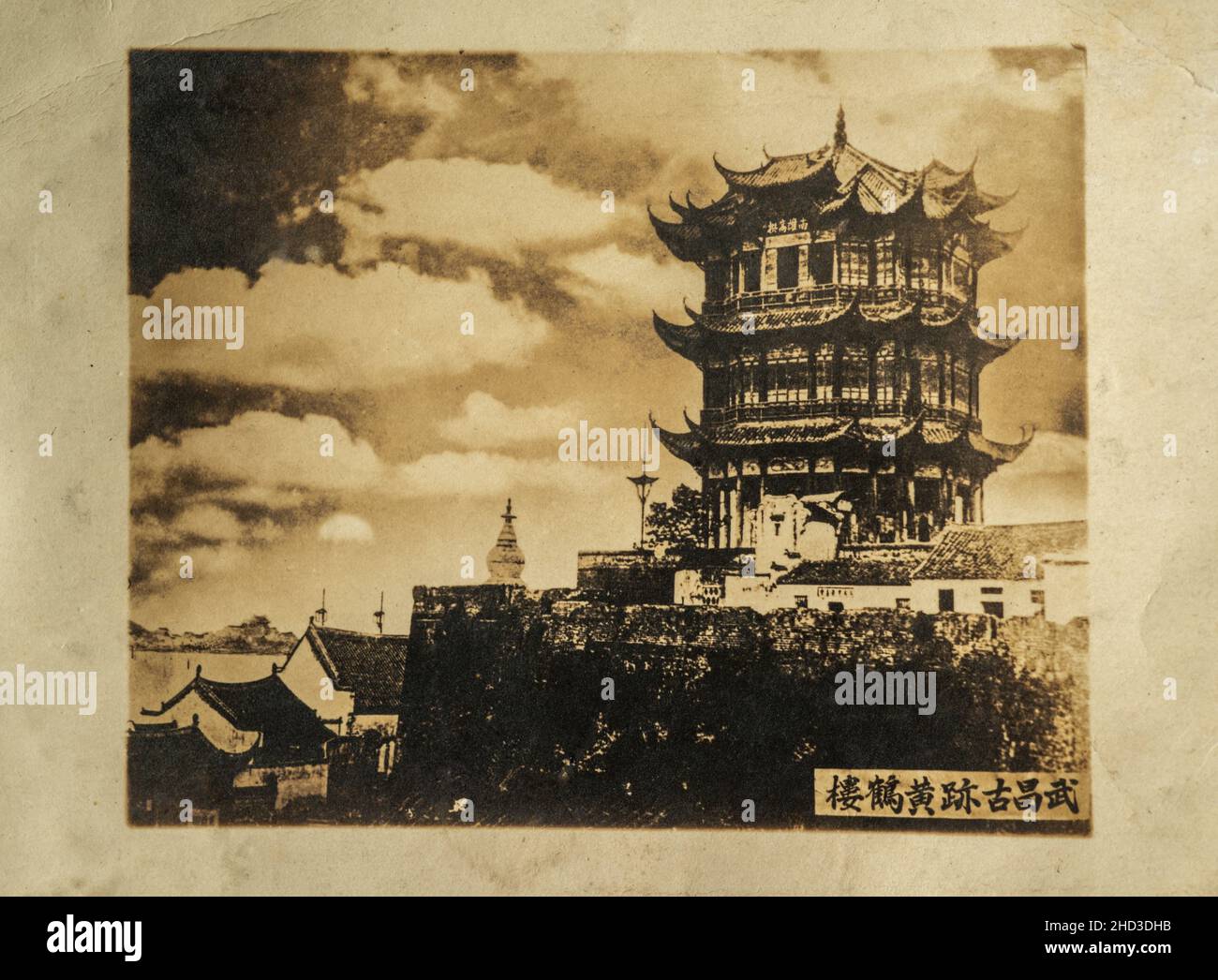 An old photo of the Yellow Crane Tower during Qing Dynasty. This version of the Yellow Crane Tower was built in 1868 and destroyed in 1884. Stock Photo