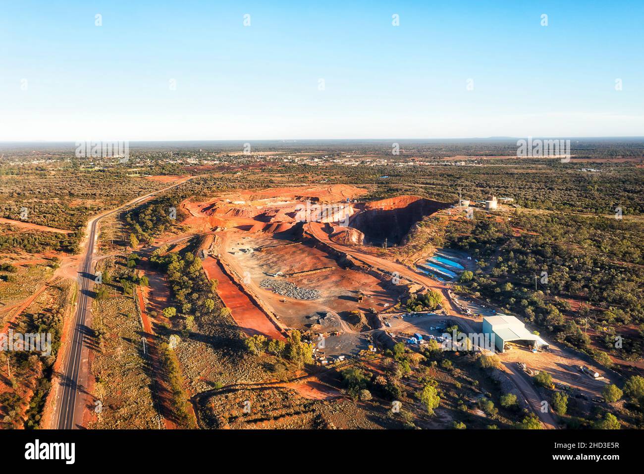 Cobar open pit copper mine near industrial town in Australia Mid West of NSW - aerial landscape. Stock Photo