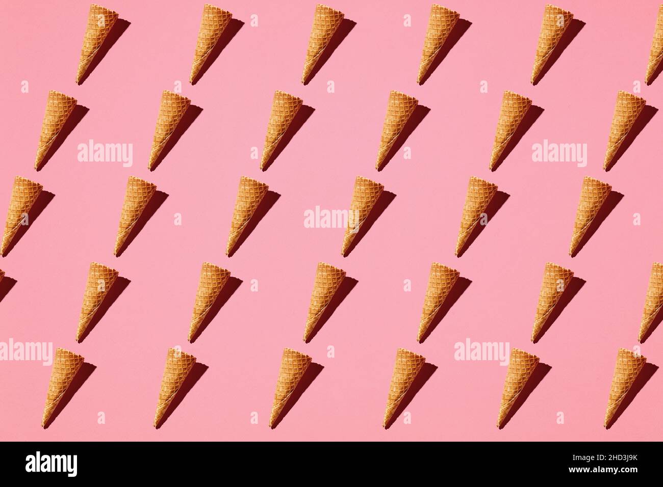 Ice cream waffle cones repetitive pattern on pink background ...
