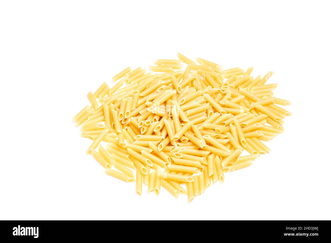 Pile of raw macaroni on a white background. Healthy food Stock Photo