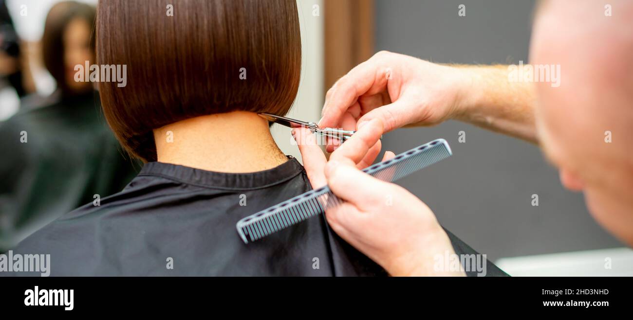 Cutting hair tips hi-res stock photography and images - Page 3 - Alamy