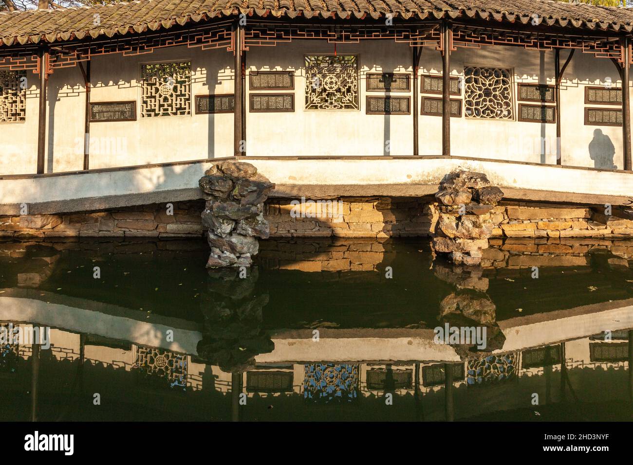 Pavilion and gallery of the Garden of the Master of the Nets in Suzhou, China Stock Photo