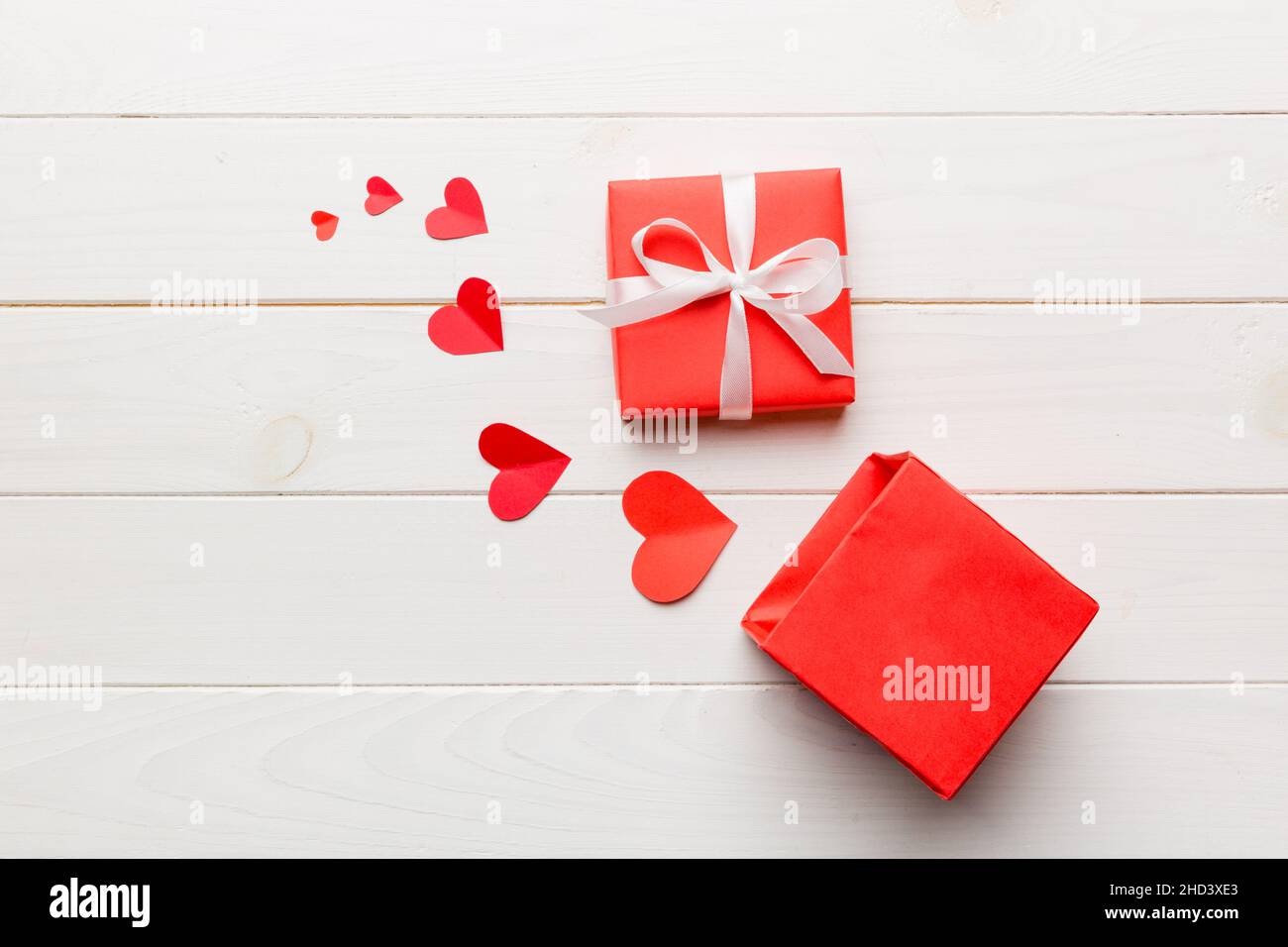 Happy valentines day opened heart shape gift box with small hearts, on ...