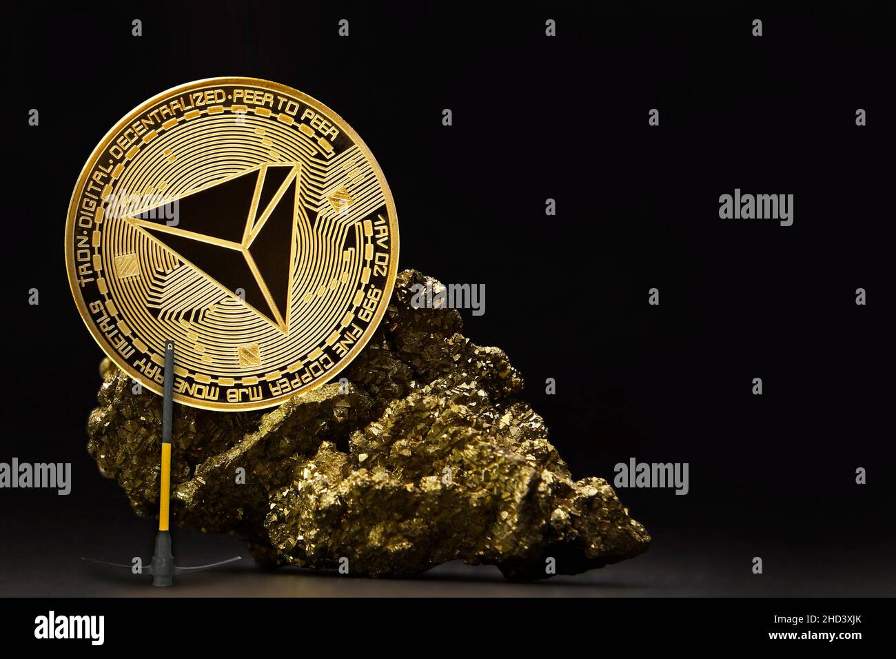 Tron in ore Cryptocurrency , Mining golden coin , Stone ore mine , future  money Stock Photo - Alamy