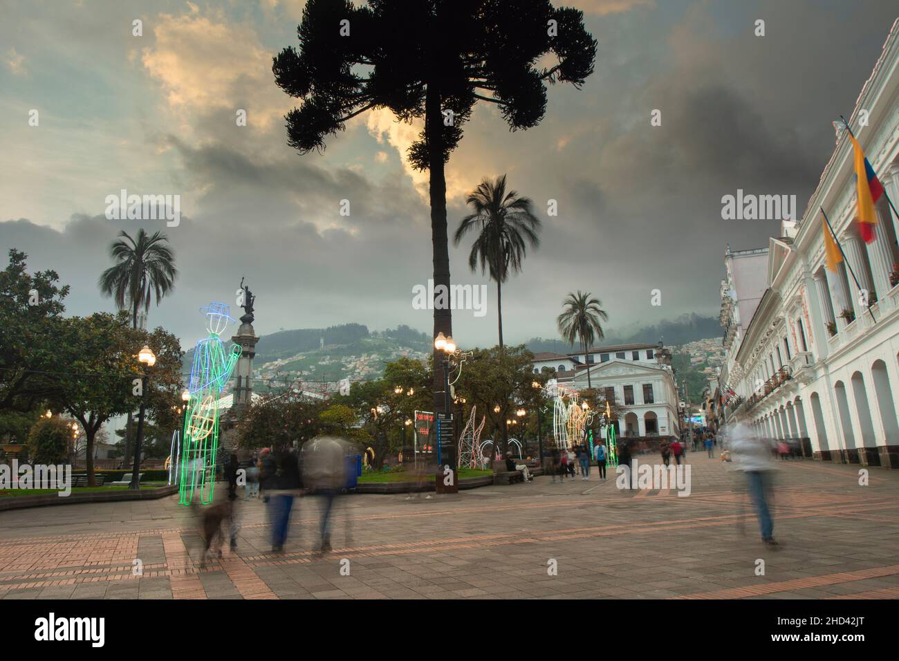 Quito, Pichincha, Ecuador - January 1 2022: Tourists walking in the big square with Christmas decorations located in the historic center of the city o Stock Photo