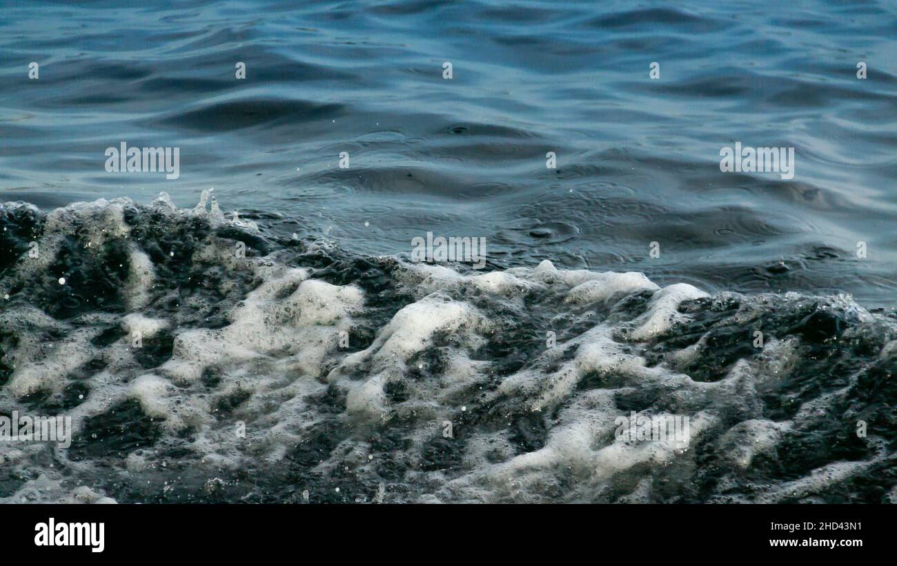 Water Splash from Wake of a Boat. White foam and Bubbles on Crest of ...