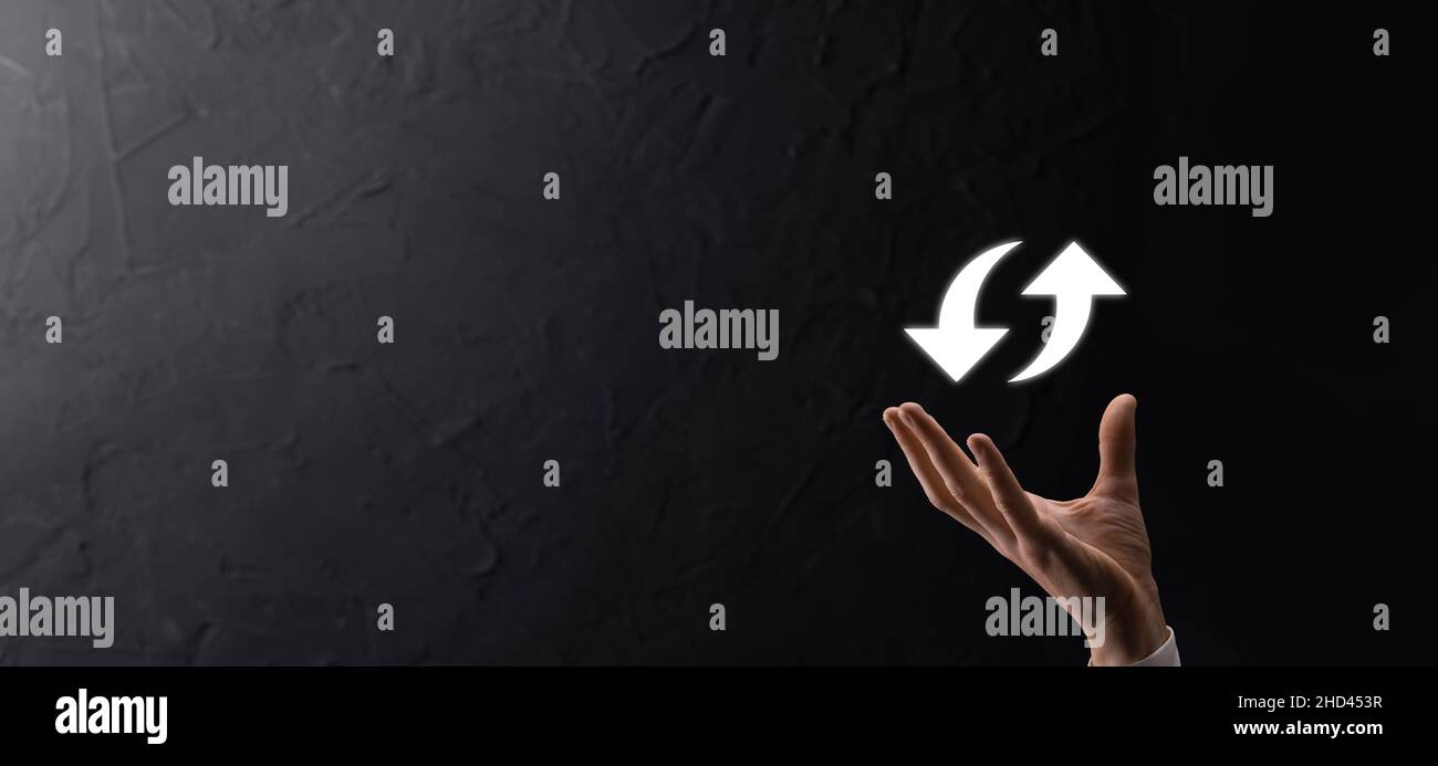 Cloud technology. Polygonal wireframe cloud storage sign with two arrows up and down on dark . Cloud computing, big data center, future infrastructure Stock Photo