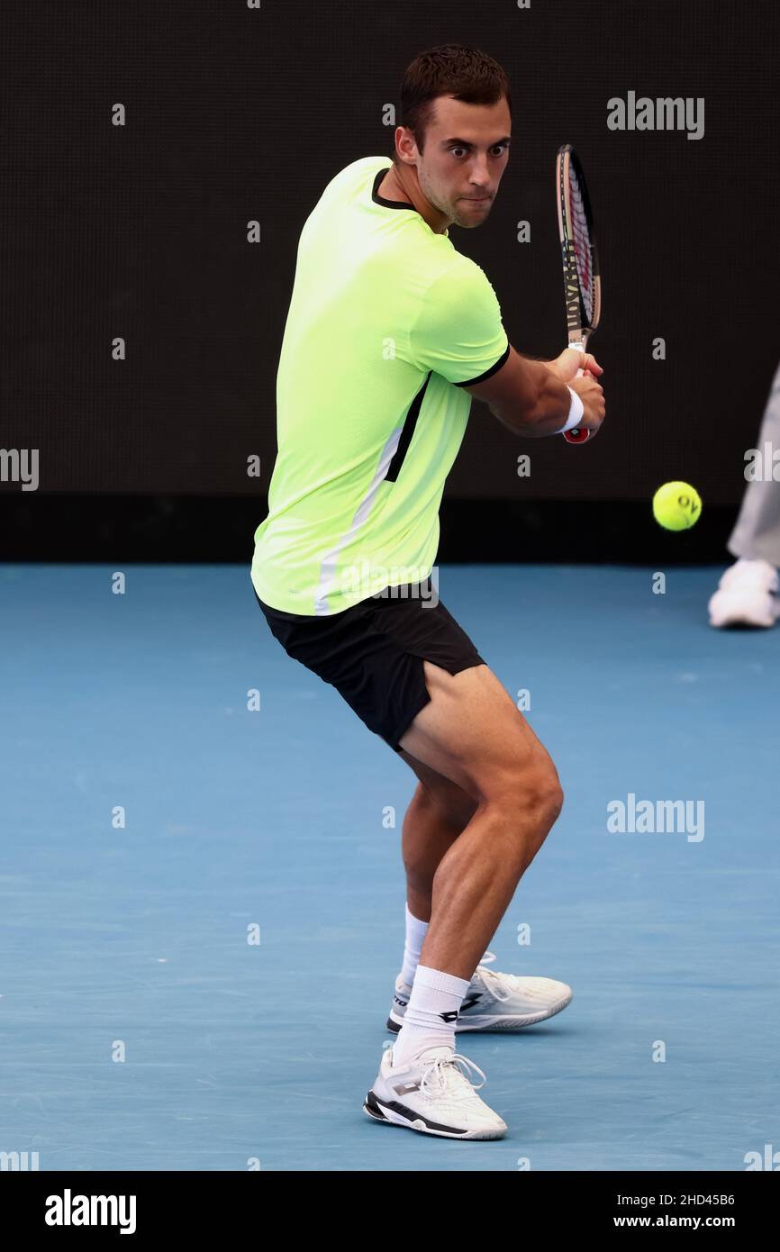Adelaide, Australia, 3 January, 2022. Laslo Djere of Serbia hits a backhand  during the ATP singles match between Laslo Djere of Serbia and Roberto  Carballes Baena of Spain on day one of
