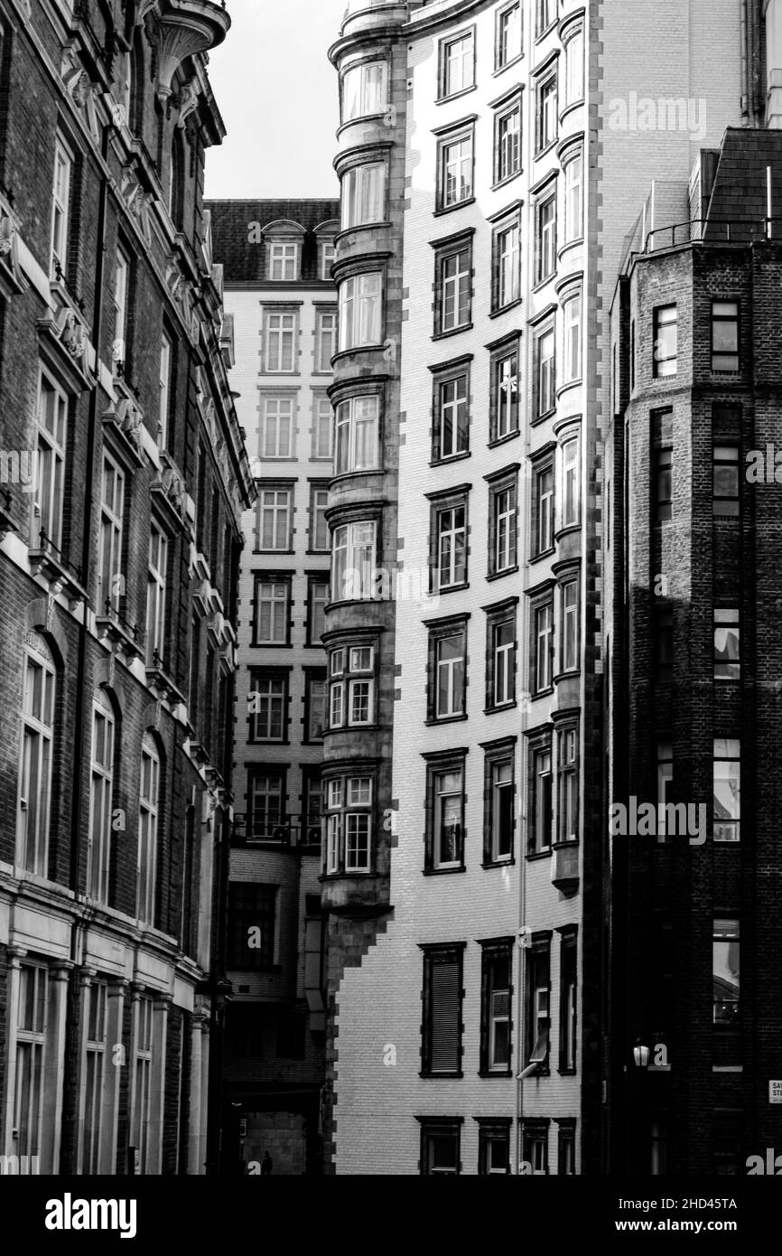 Vertical shot of architectural buildings in London, England, grayscale ...