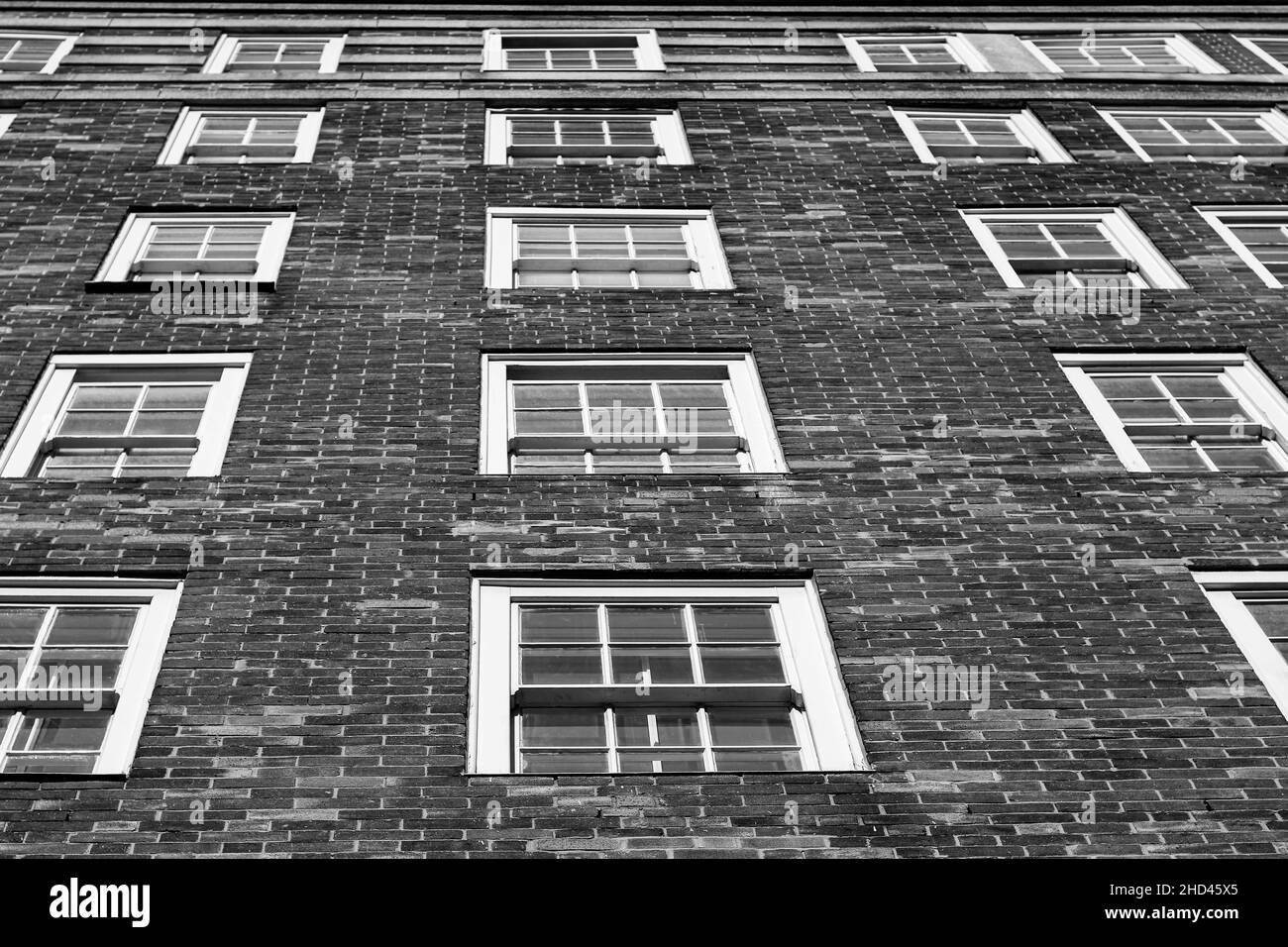 Low angle shot of an architectural building in London, England, grayscale image Stock Photo