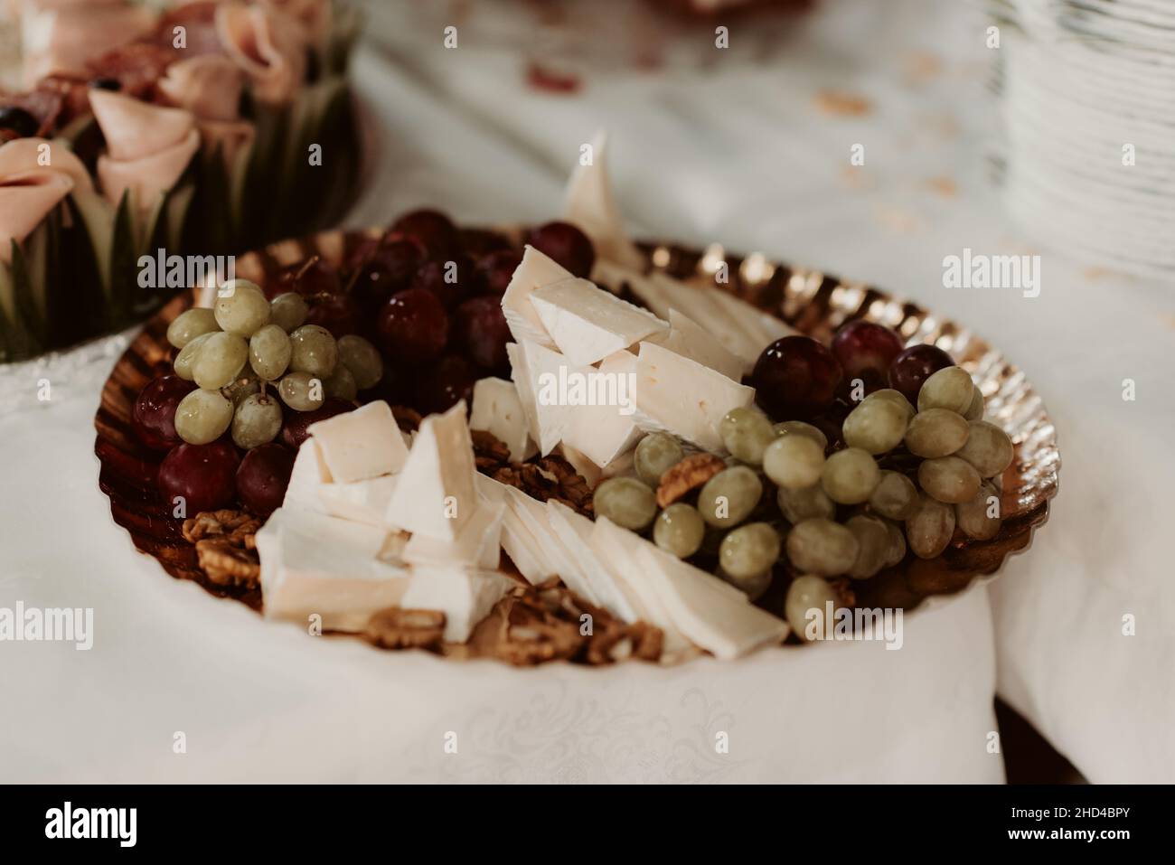 Snacks and appetizer on the wedding table Stock Photo - Alamy