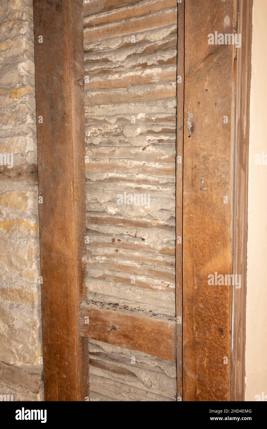 Internal lath and plaster wall construction detail, Kirby Hall, an Elizabethan country house, located near Gretton, Northamptonshire, England. Stock Photo