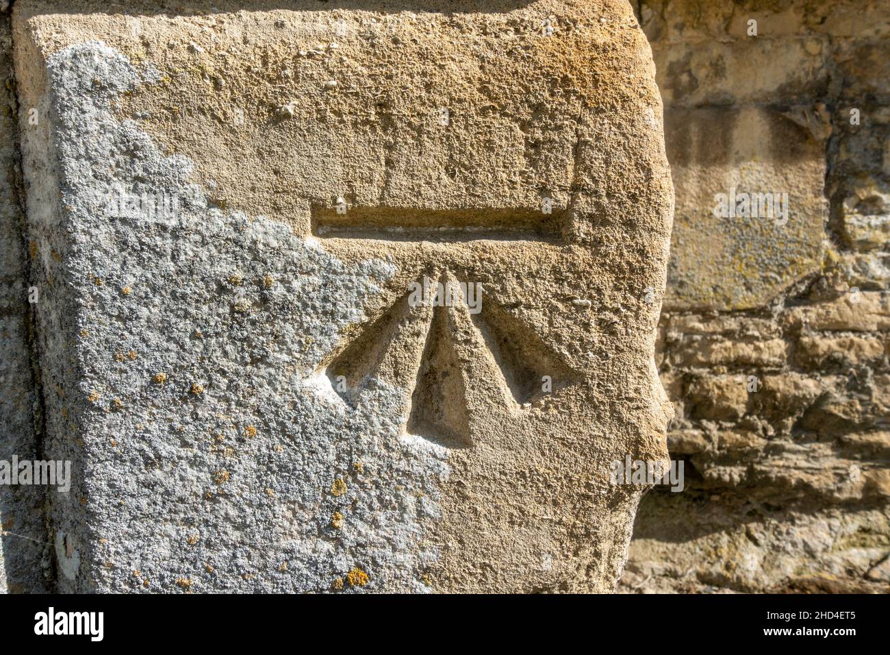 A surveying benchmark on Kirby Hall, an Elizabethan country house, located near Gretton, Northamptonshire, England. Stock Photo