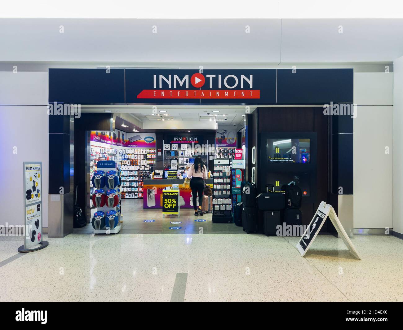 New York, USA - December 25, 2021: Horizontal View of InMotion Entertainment Shop inside John F. Kennedy Airport Terminal 5, InMotion InMotion is the Stock Photo
