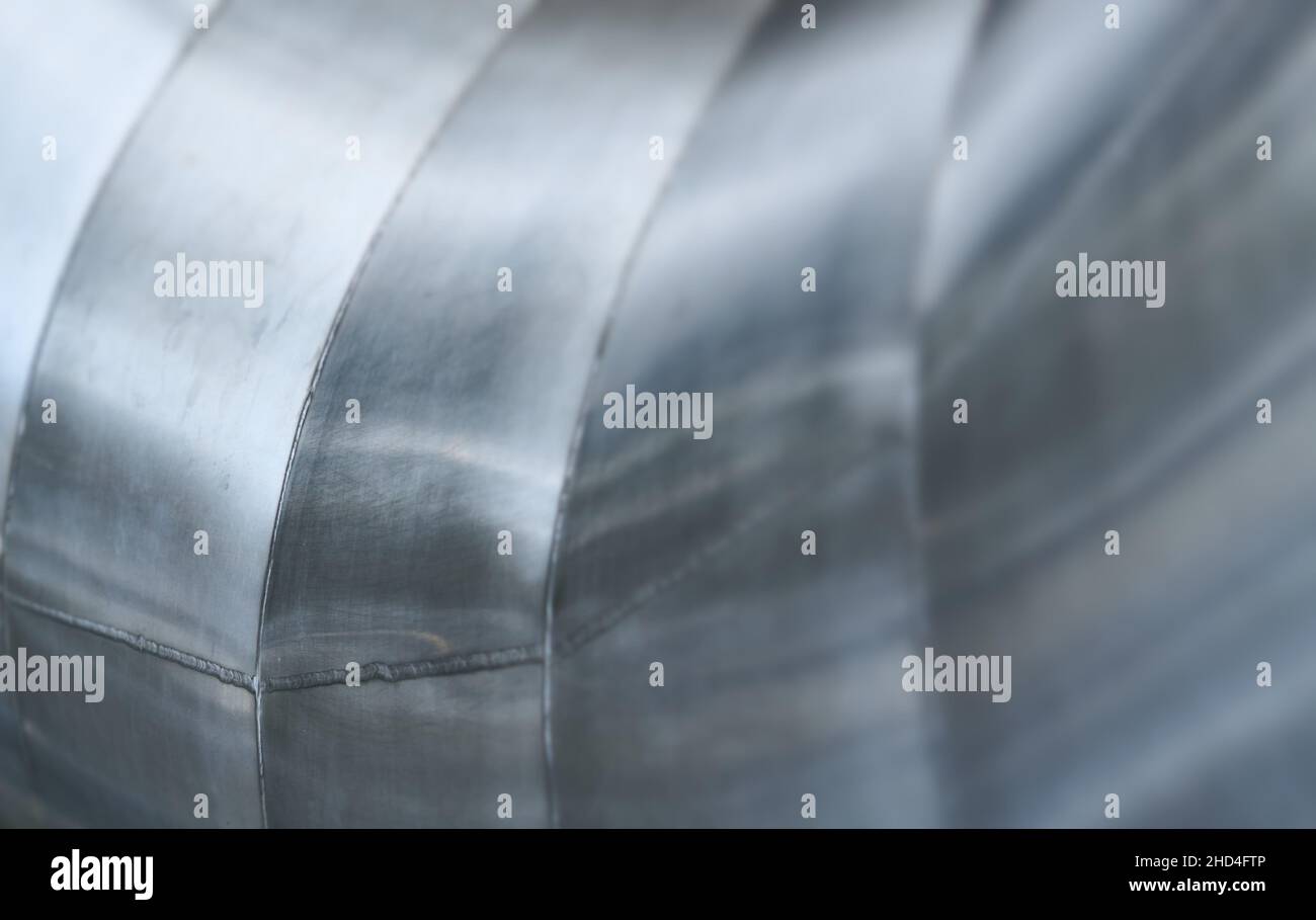 Close Up Of A Brushed Stainless Steel Welded Tube Pipe, UK Stock Photo