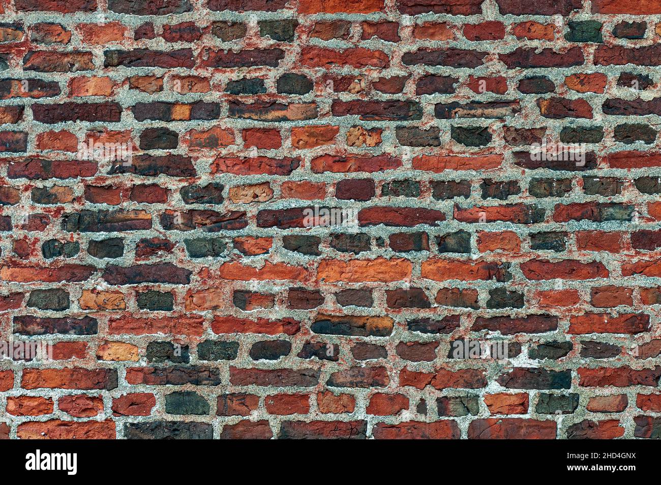 Grunge old weathered brick wall. Suitable for background. Stock Photo