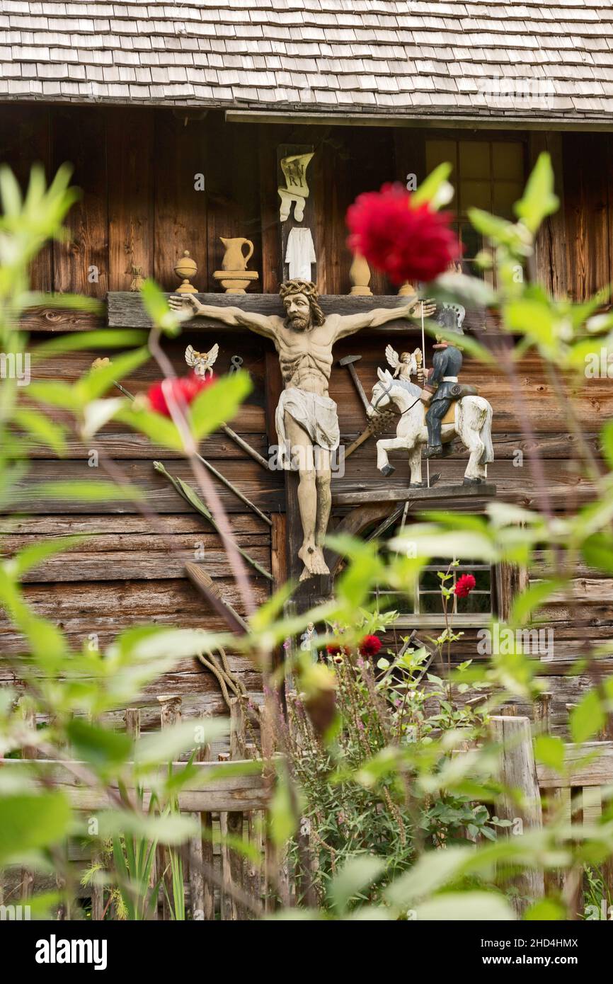 Black Forest, Vogtsbauernhof, Germany: historical crucifix at farmhouse. (The Black Forest Open Air Museum Vogtsbauernhof) Stock Photo