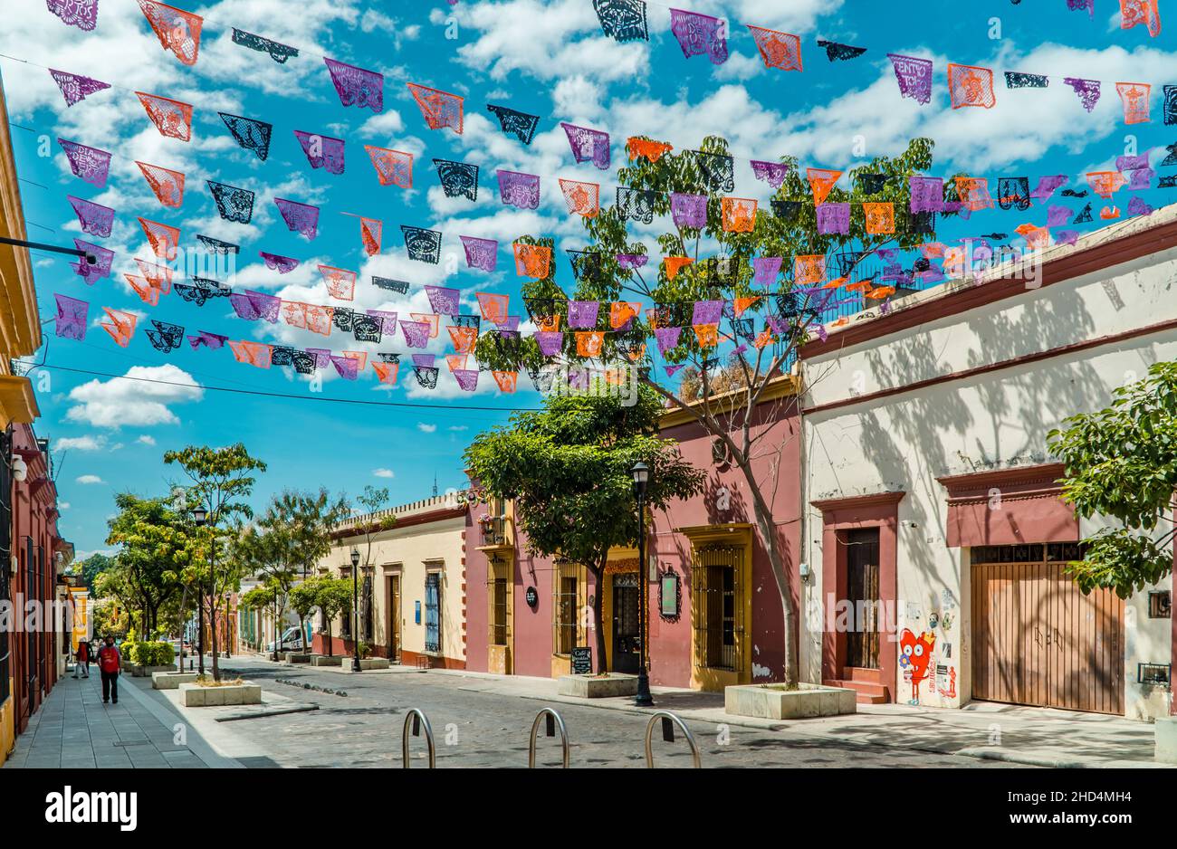 Colorful colonial architecture and Day of the Dead decorations in downtown Oaxaca, Mexico Stock Photo