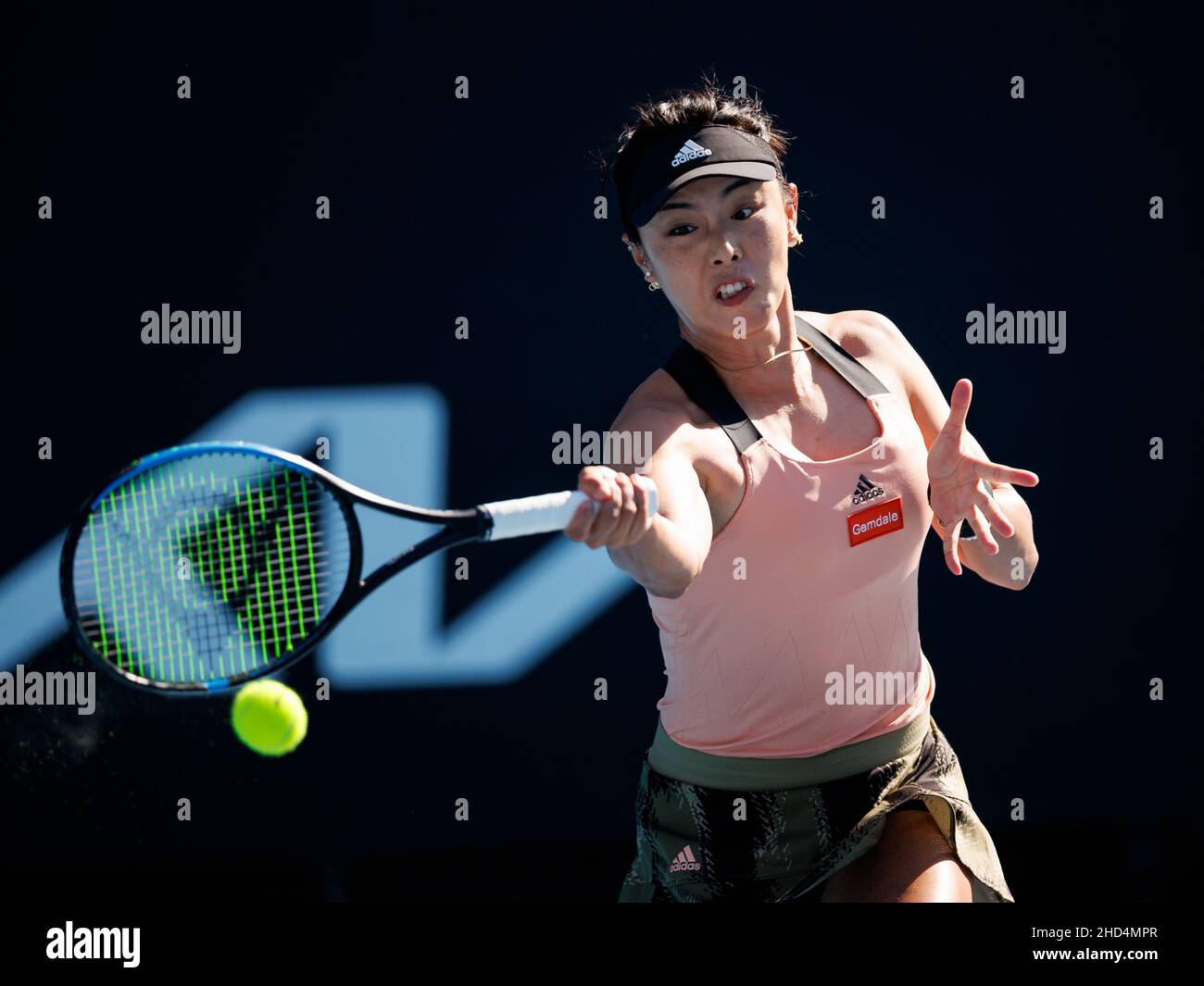 QIANG WANG (CHN) in action at the 2022 Melbourne Summer Set Qualifying on Monday January 2022,  Melbourne Park Stock Photo