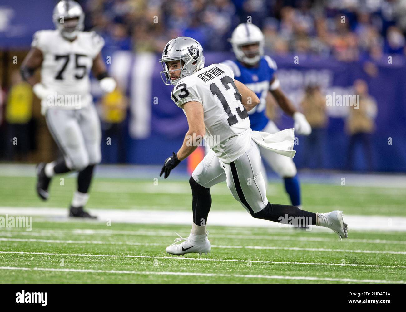 Indianapolis, Indiana, USA. 02nd Jan, 2022. Las Vegas Raiders wide receiver  Hunter Renfrow (13) runs with the ball after the catch during NFL football  game action between the Las Vegas Raiders and