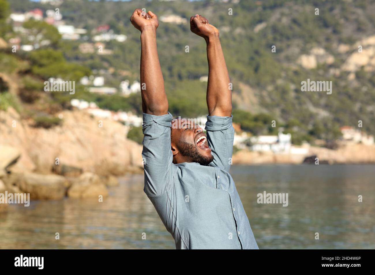 Excited black man hi-res stock photography and images - Alamy