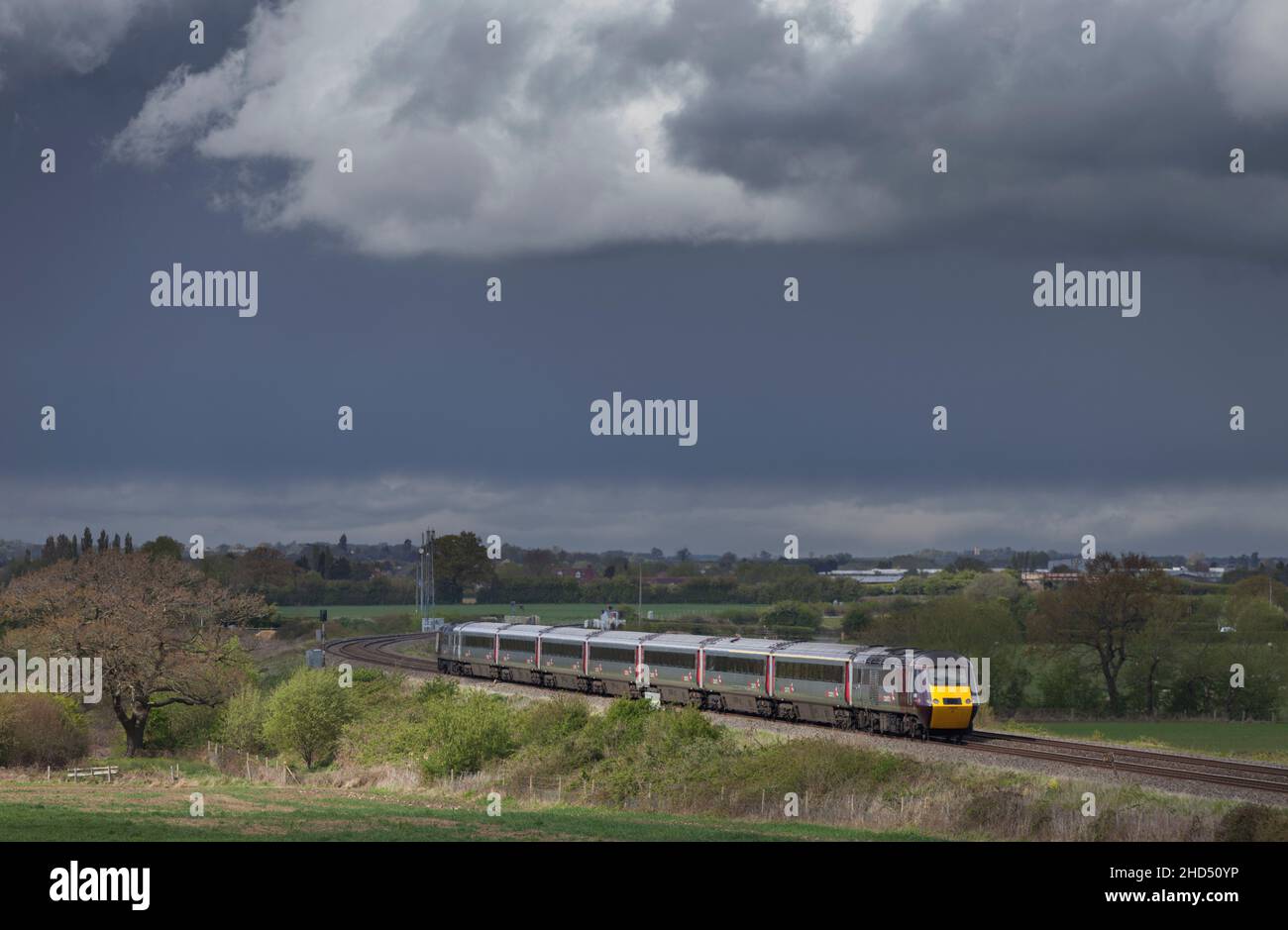 Cross country trains High speed train ( Intercity 125 ) running through the Gloucestershire countryside with copy space in a  black sky Stock Photo