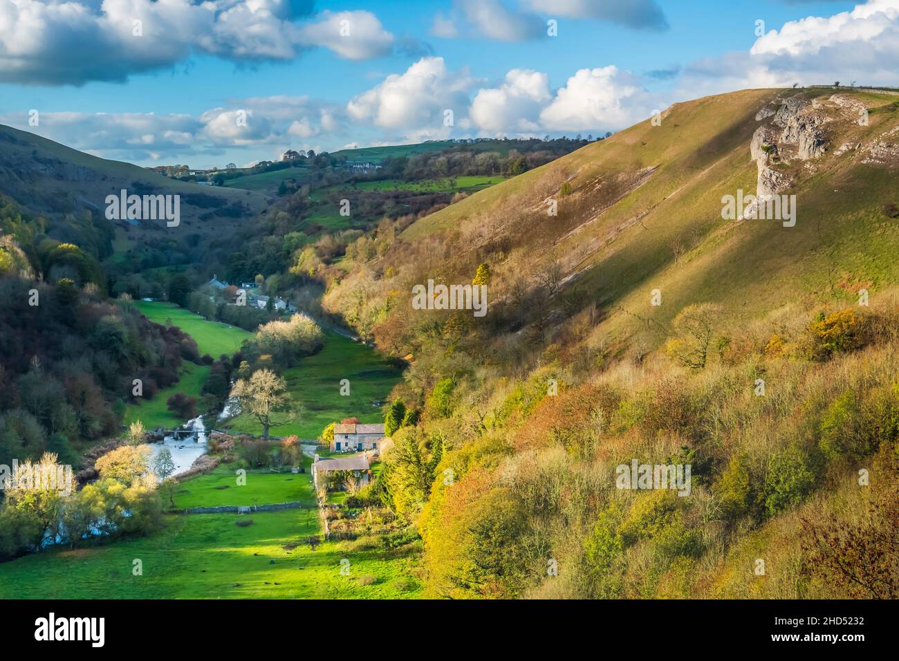 The river Wye has cut deep into the surrounding limestone in the the Derbyshire Peak District. Stock Photo