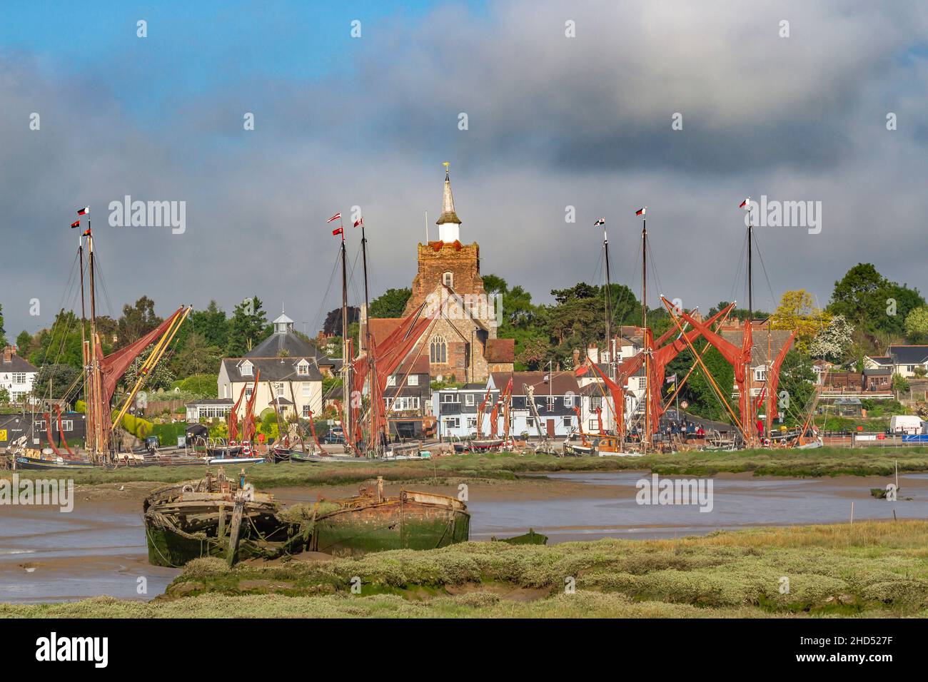 Hythe quay with Thames sailing barges at Maldon from across the Blackwater. Stock Photo