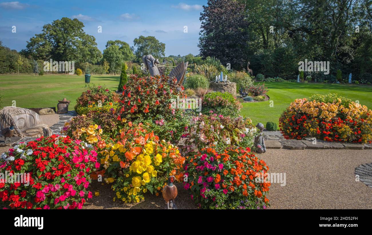 Beautiful flower tubs in a large garden. Stock Photo