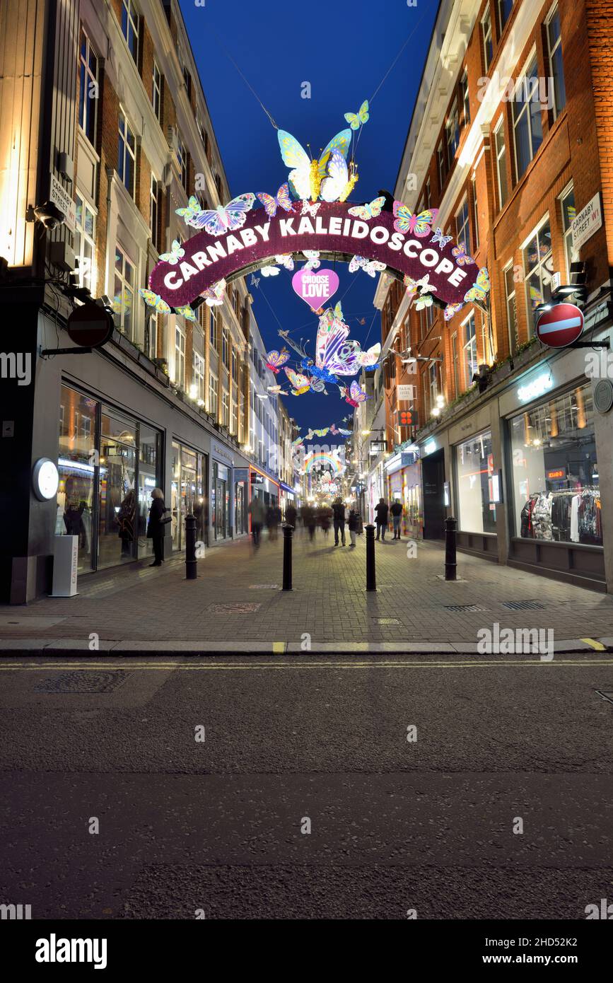 evening Carnaby Street illuminations, Soho, near Regent Street, Westminster, London, United Kingdom Stock Photo