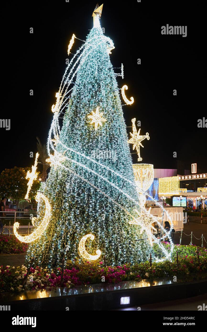 Sharm El Sheikh, Egypt - November 20, 2021: Night festive illumination and Christmas tree of New Year holiday at famous place SOHO Square Stock Photo