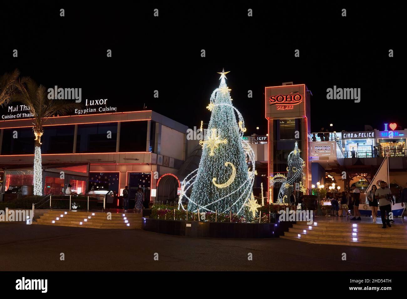 Sharm El Sheikh, Egypt - November 20, 2021: Night festive illumination and Christmas tree of New Year holiday at famous place SOHO Square Stock Photo