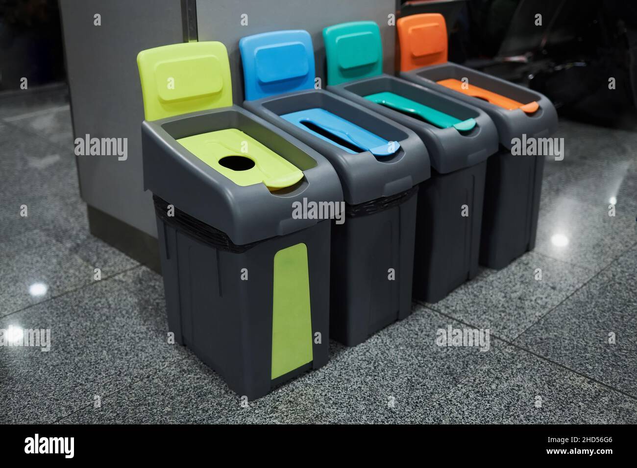 Four color coded recycle garbage bins. Waste separation concept Stock