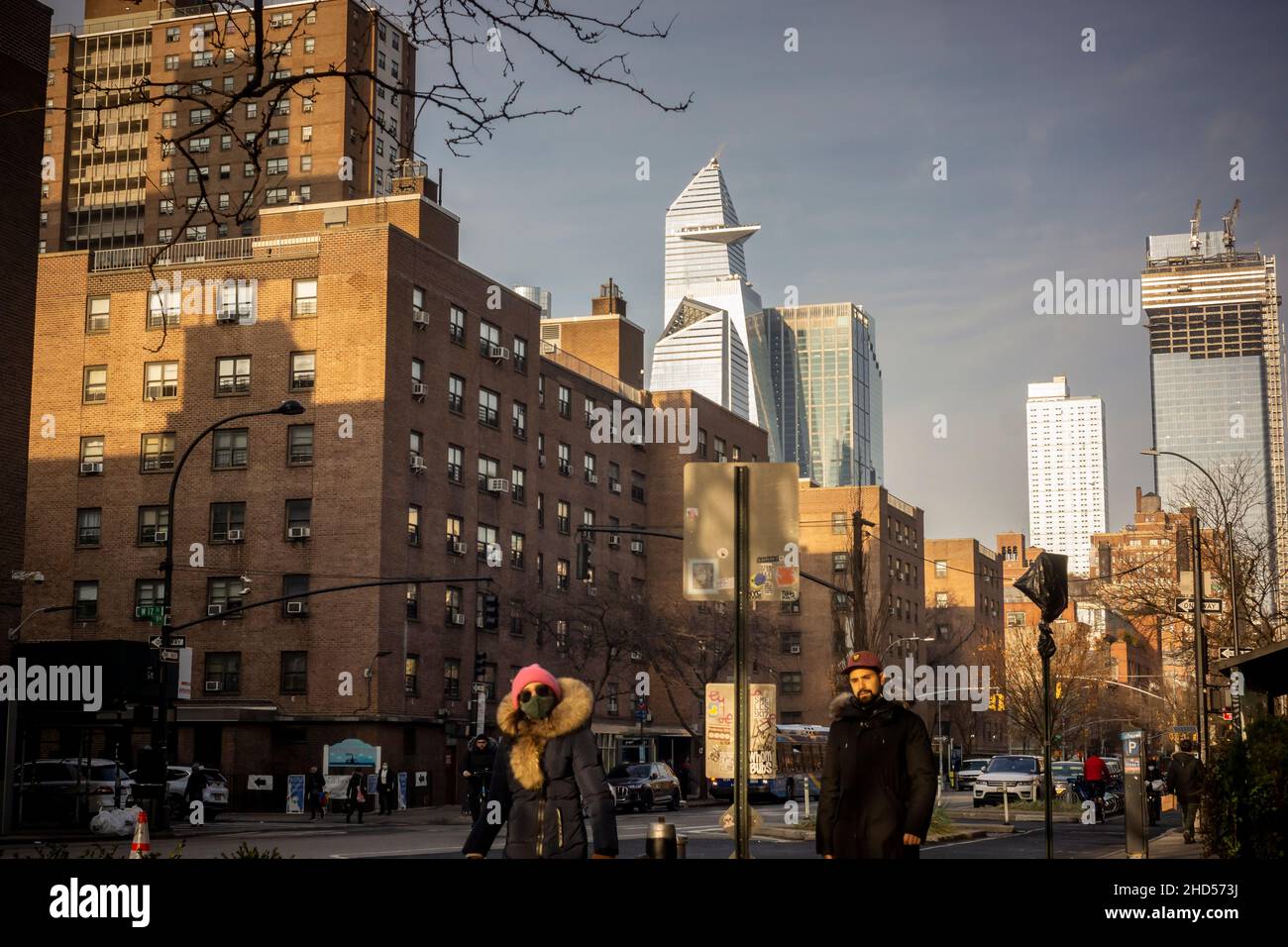 The massive Hudson Yards development looms over the NYCHA Fulton Houses complex of apartments in Chelsea in New York on Friday, December 24, 2021.  (© Richard B. Levine) Stock Photo