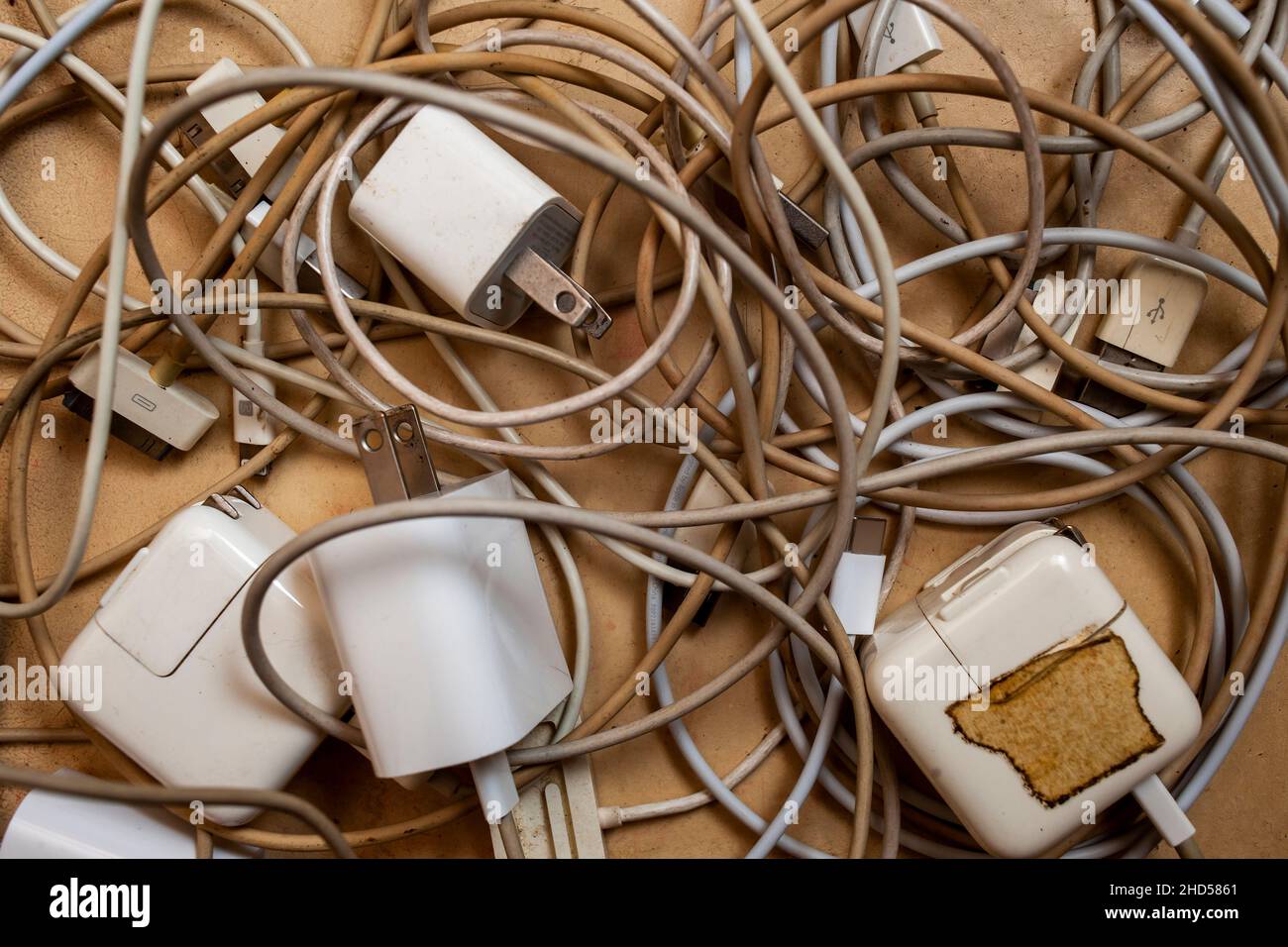 A ÒratÕs nestÓ of various power cords for Apple Computer products in a drawer in New York, seen on Monday, December 27, 2021. (© Richard B. Levine) Stock Photo