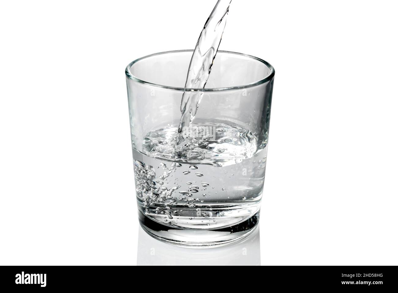 fresh water pouring into the glass isolated on white Stock Photo Alamy