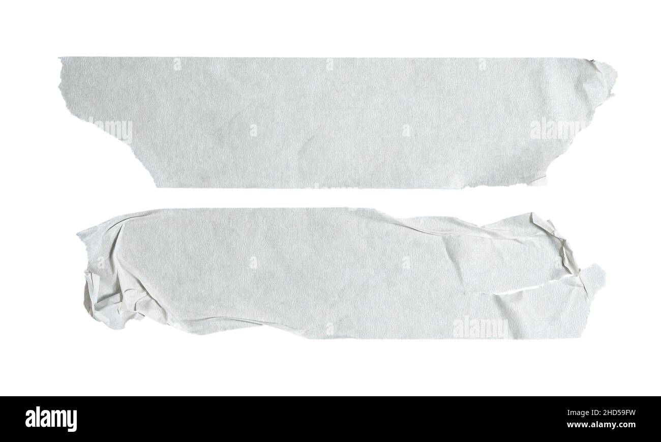White tapes. Adhesive torn, ripped, crumpled paper strips isolated on white background. Stock Photo