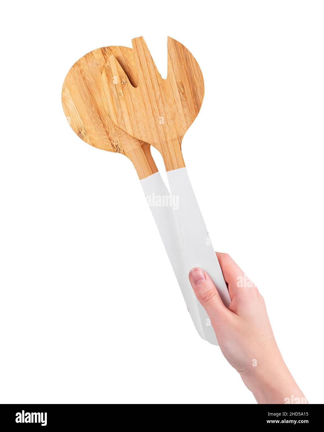 Kitchen utensil in hand isolated on white background. Stock Photo