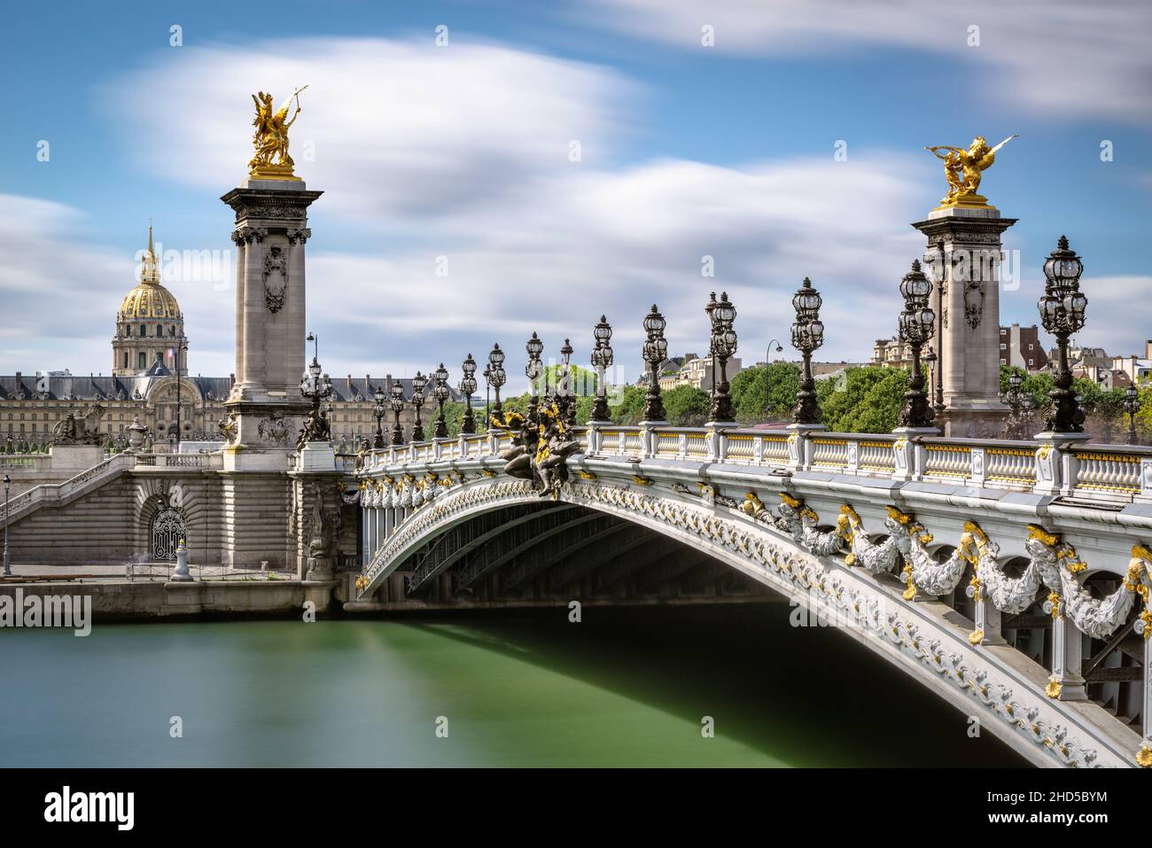 Pont Alexandre III Bridge over the Seine River with view of the Invalides (UNESCO World Heritage Site). 7th Arrondissement, Paris, France Stock Photo