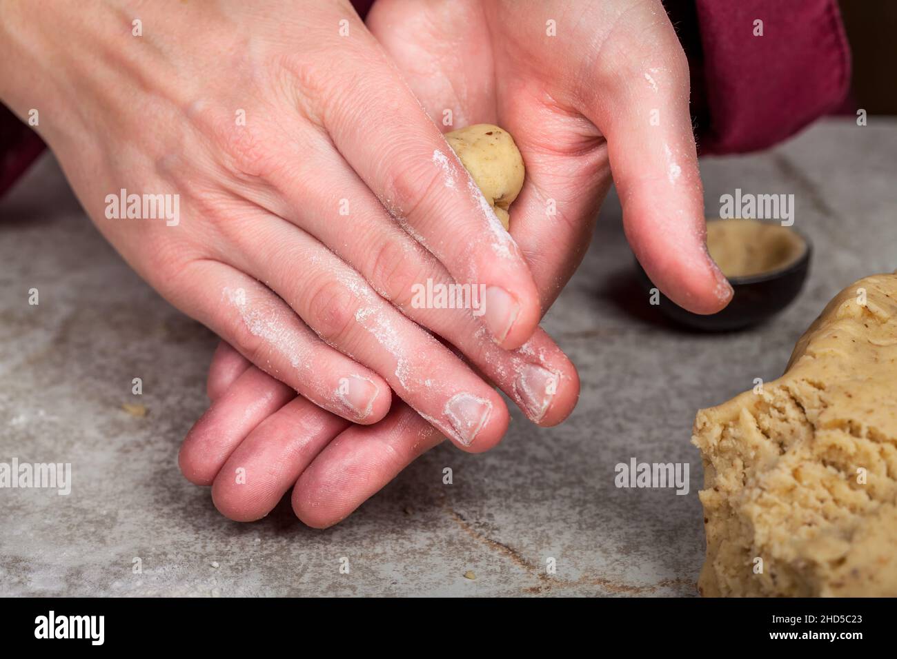 The finished dough made of flour, icing sugar, butter and grated nuts