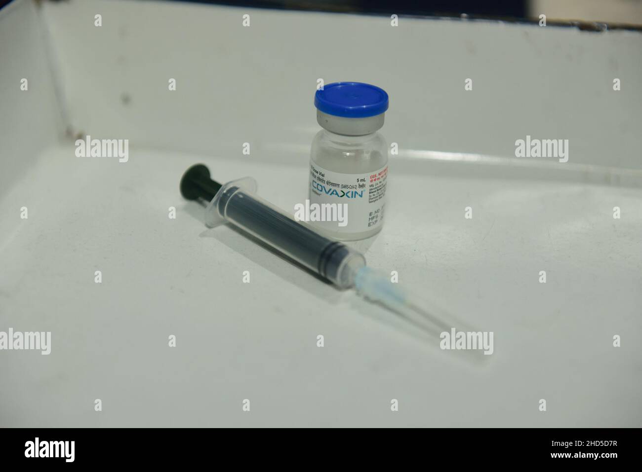 Kolkata, India. 1st Jan, 2014. A syringe and a Covaxin vaccine vial seen during the vaccination of students at Uccha Balika Vidyalaya (Barisha) school in Kolkata.In India Covid vaccination for 15 to 18 year age group starts today. Nearly 2.7 million teenagers have registered for their jabs even as a country witnessing a sharp surge of Covid-19 cases fueled by the new Omicron variant of coronavirus. (Credit Image: © Sumit Sanyal/SOPA Images via ZUMA Press Wire) Stock Photo