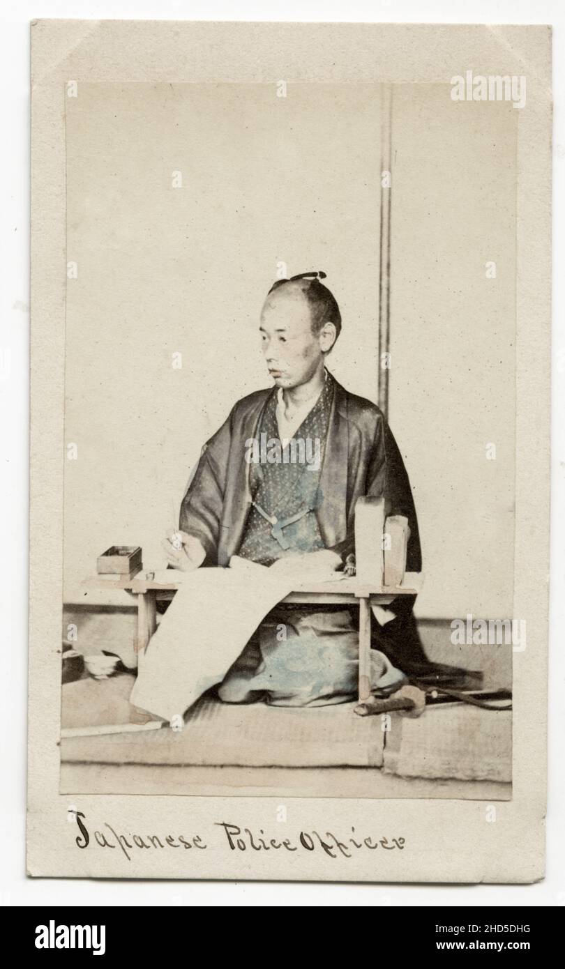 19th century vintage photograph - 1860's Japan carte de visite attributed to Felix Beato studio: Japanese police officer. Stock Photo