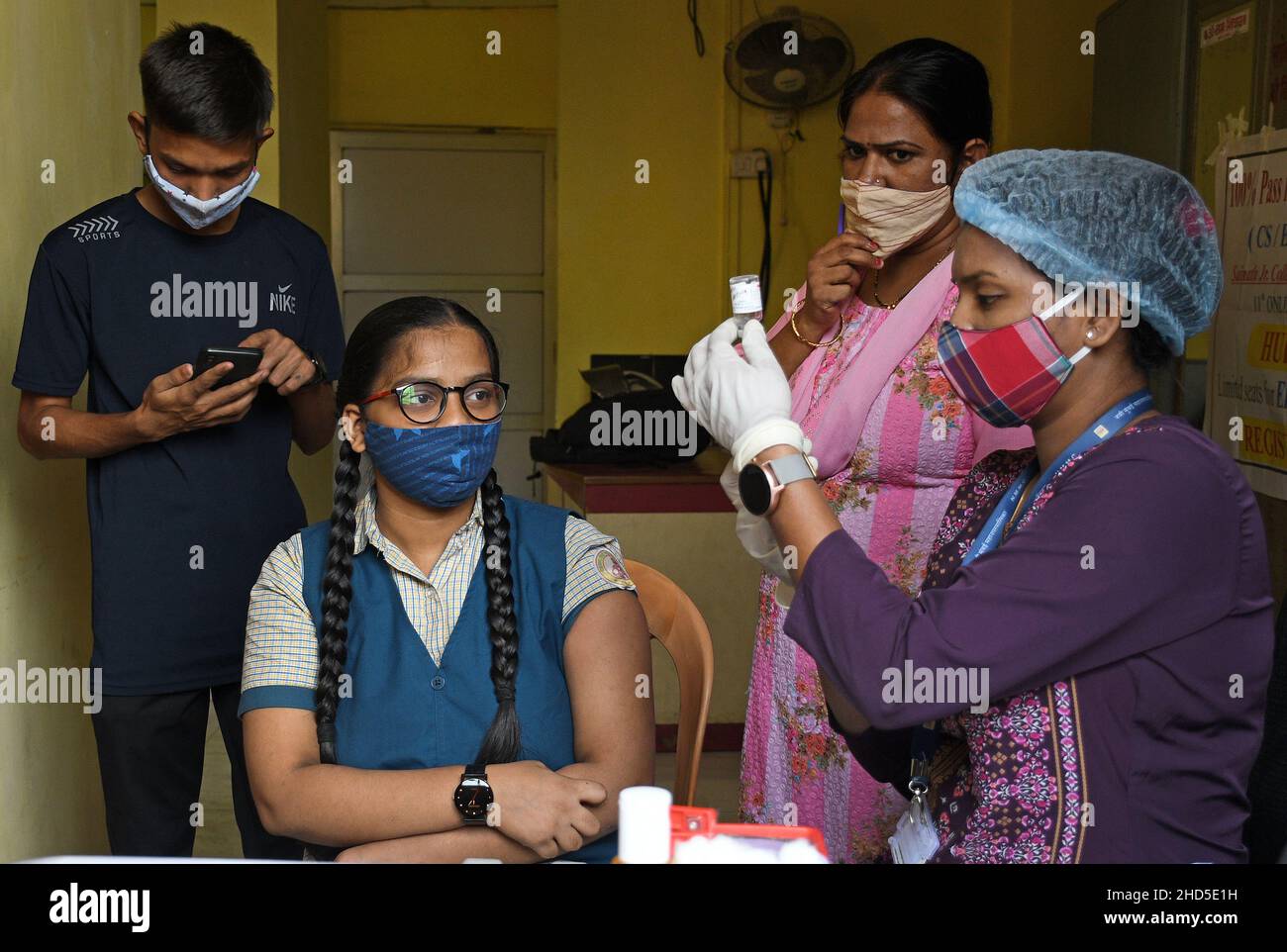 Mumbai, India. 03rd Jan, 2022. A health worker prepares to administer a dose of Covaxin vaccine to a student of Sainath school in Navi Mumbai.Vaccination for children in the age group of 15-18 years of age was launched in India. (Photo by Ashish Vaishnav/SOPA Images/Sipa USA) Credit: Sipa USA/Alamy Live News Stock Photo